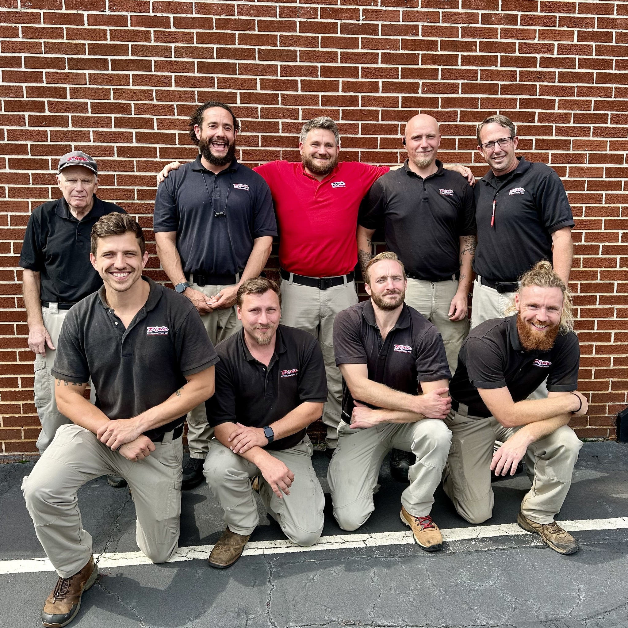 Dixie Exterminators technician greeting a homeowner